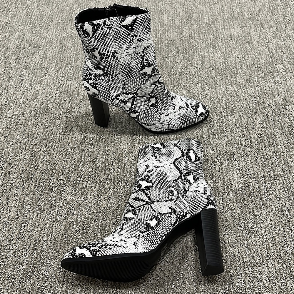 Never Worn Fashion Nova leather heeled boots!